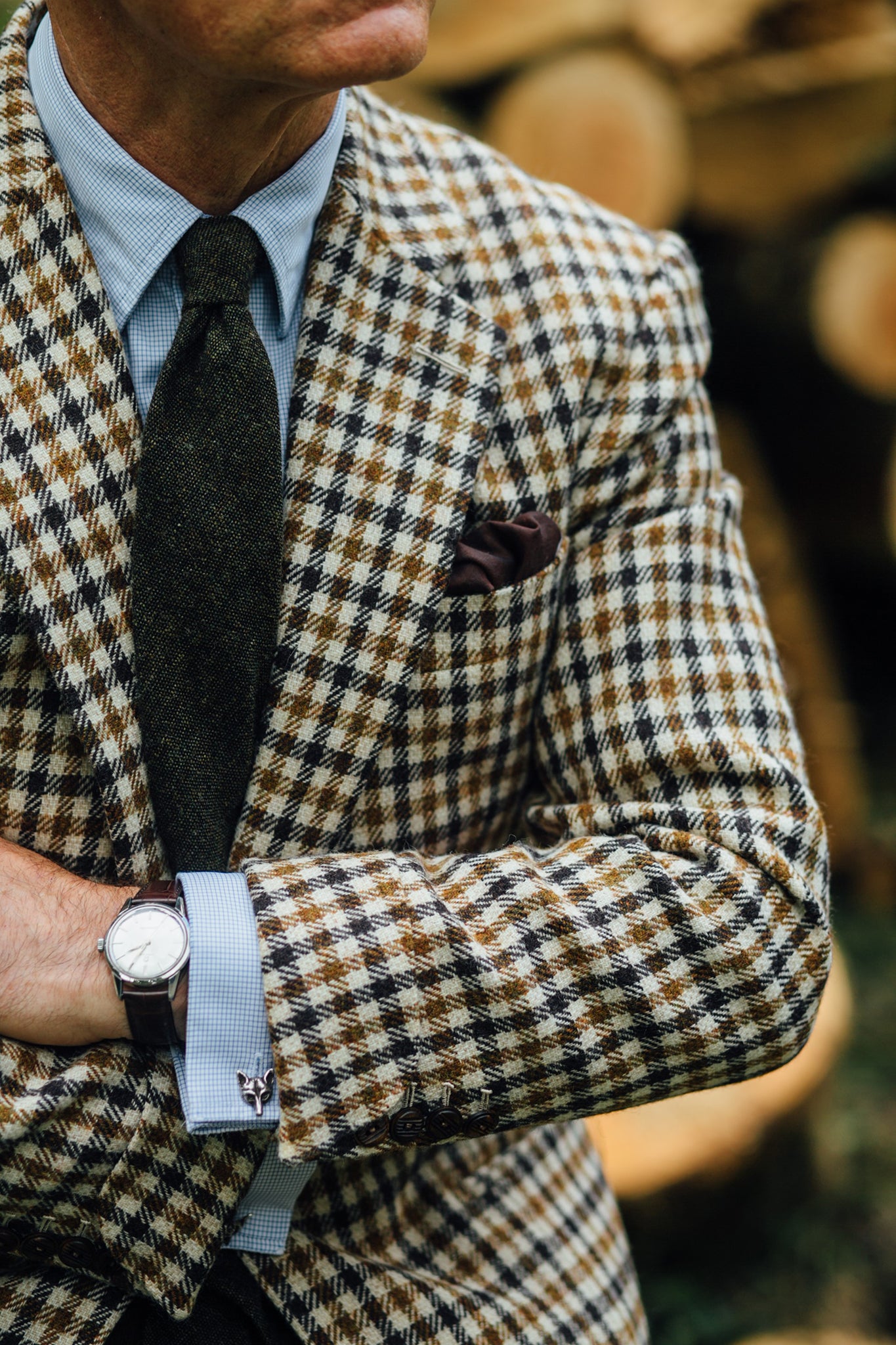 Detail of Fox Mask cufflinks with traditional Fox Brothers tweed jacket