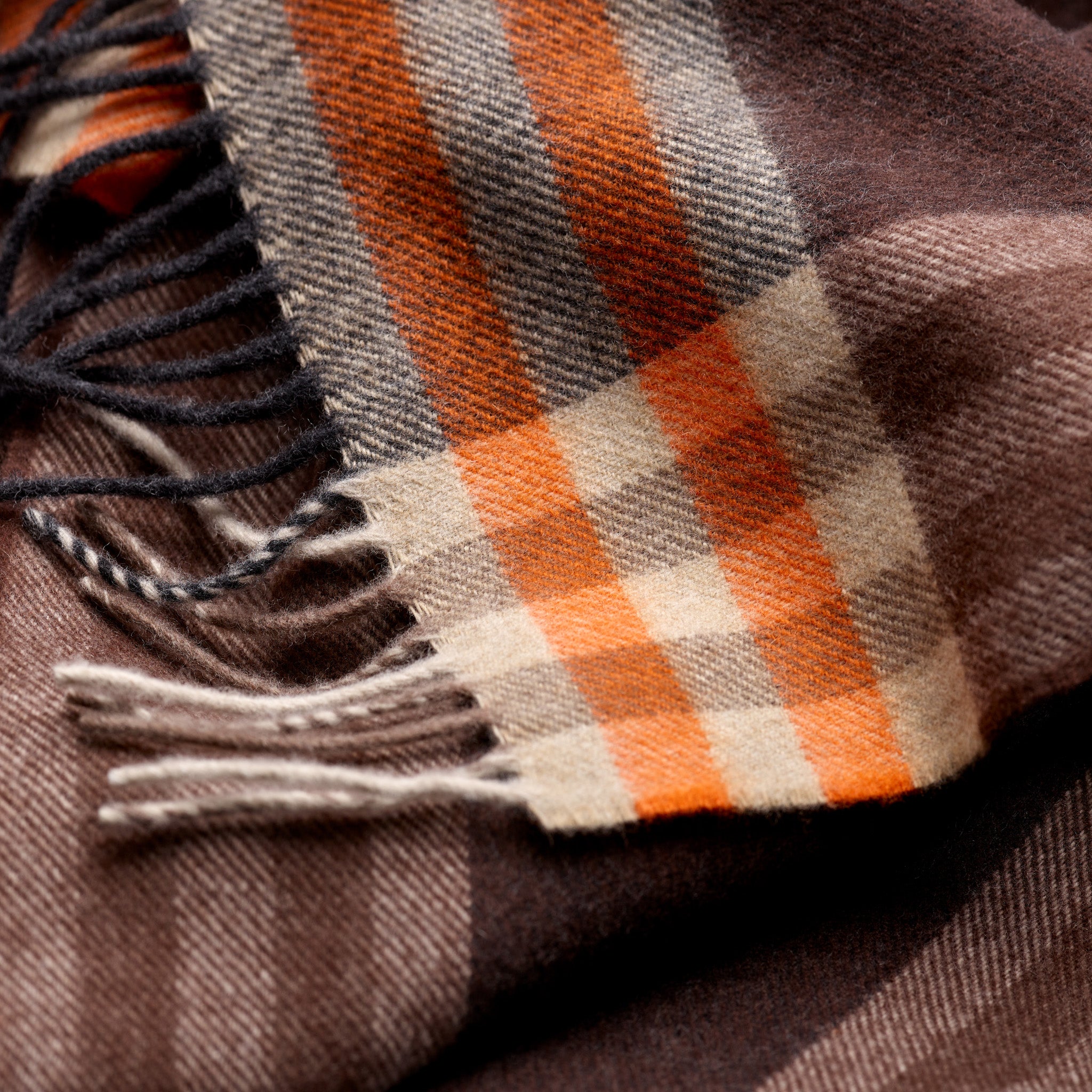 Tasselled hem detail on Fox Brown and Orange Cashmere & Wool Check Scarf