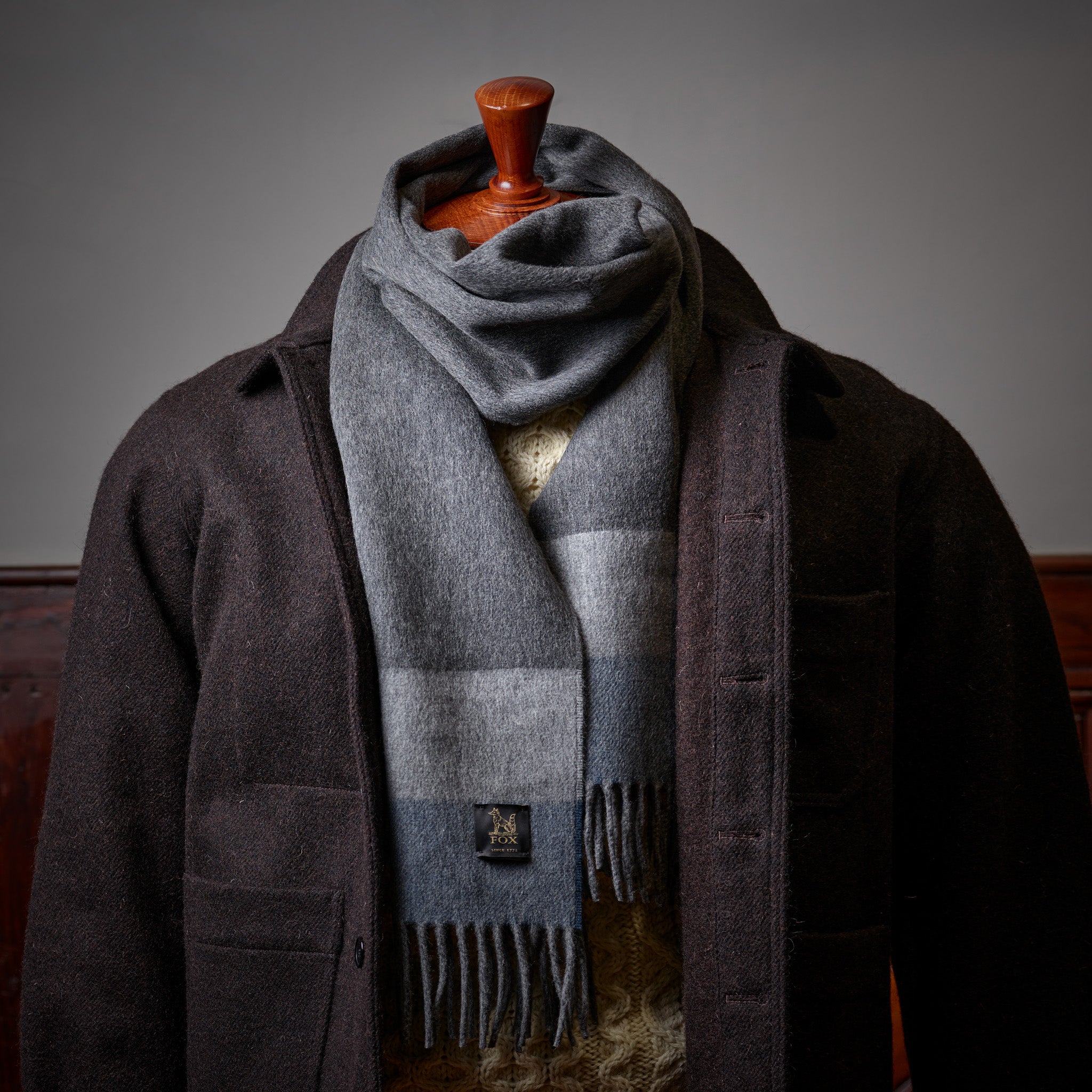 Fox grey and blue cashmere and wool brushed scarf styled with a Havanna Brown Tours Jacket