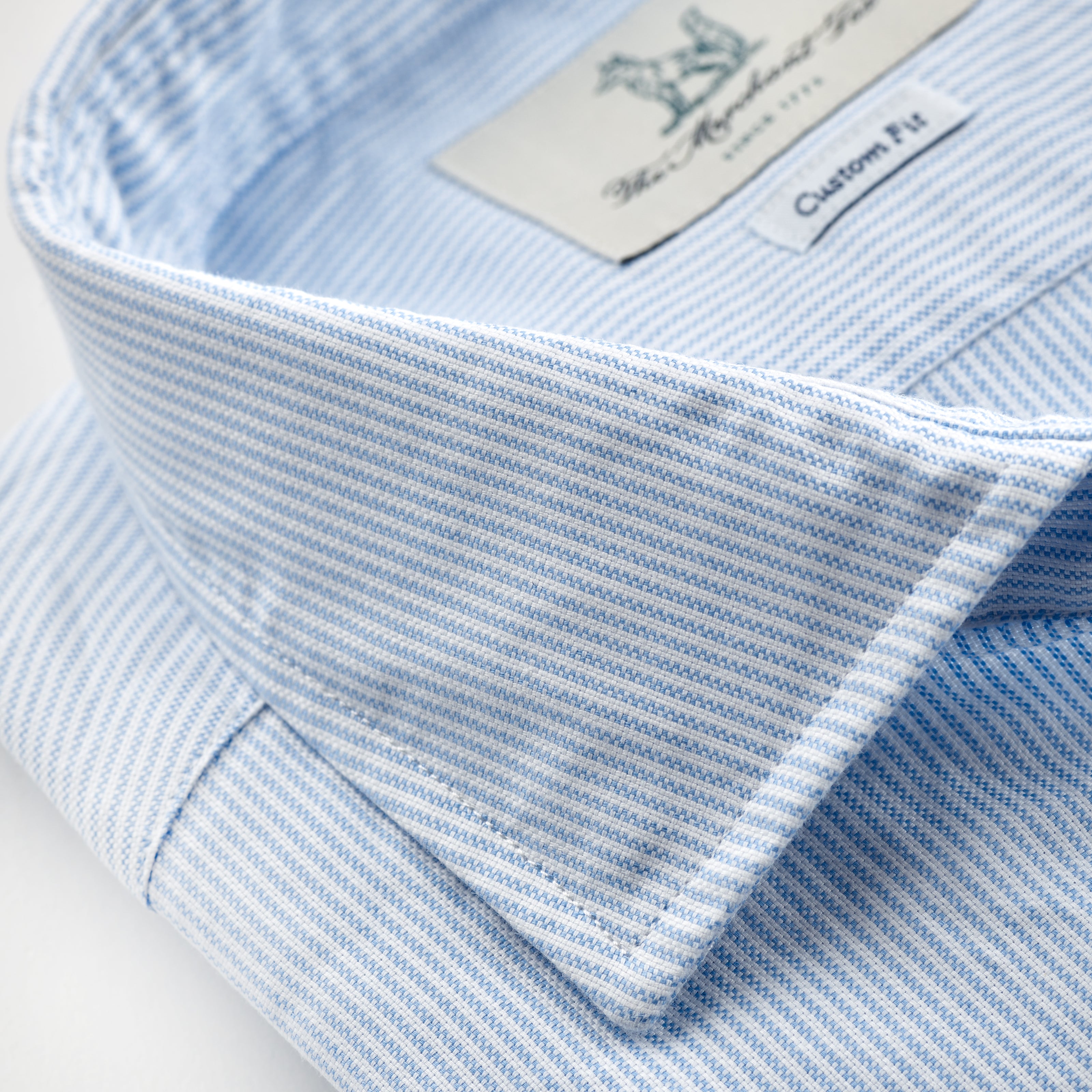 Thin blue and white striped spread collar oxford shirt