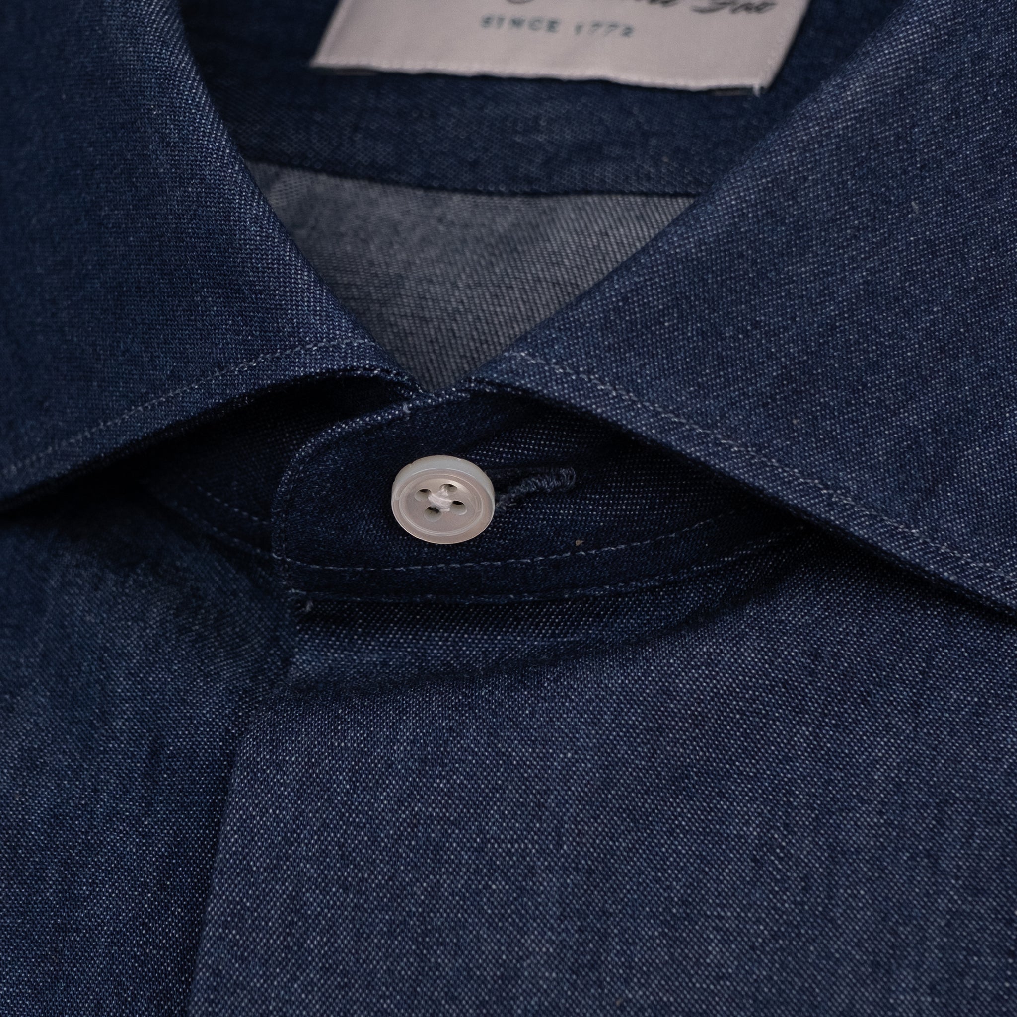 The Niven Fox Weekend Dark Wash Denim Shirt button detail