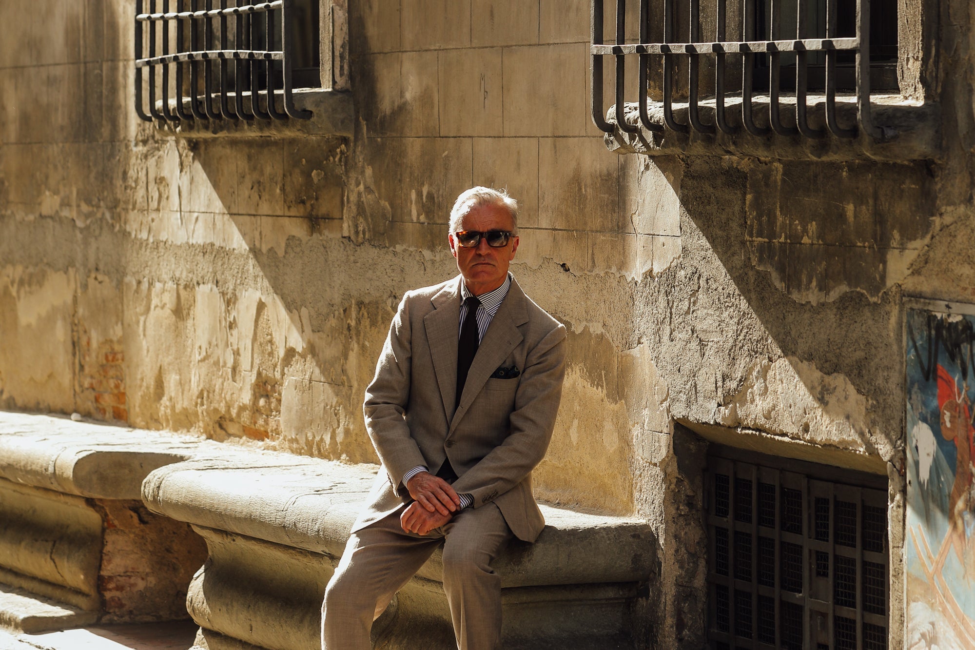Douglas Cordeaux wearing The Niven Fox classic light blue popeline stripe shirt in Florence, Italy
