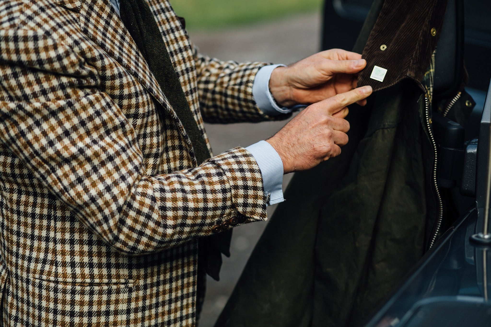 Douglas Cordeaux wearing Fox Tweed jacket styled with Fox Mask sterling silver cufflinks