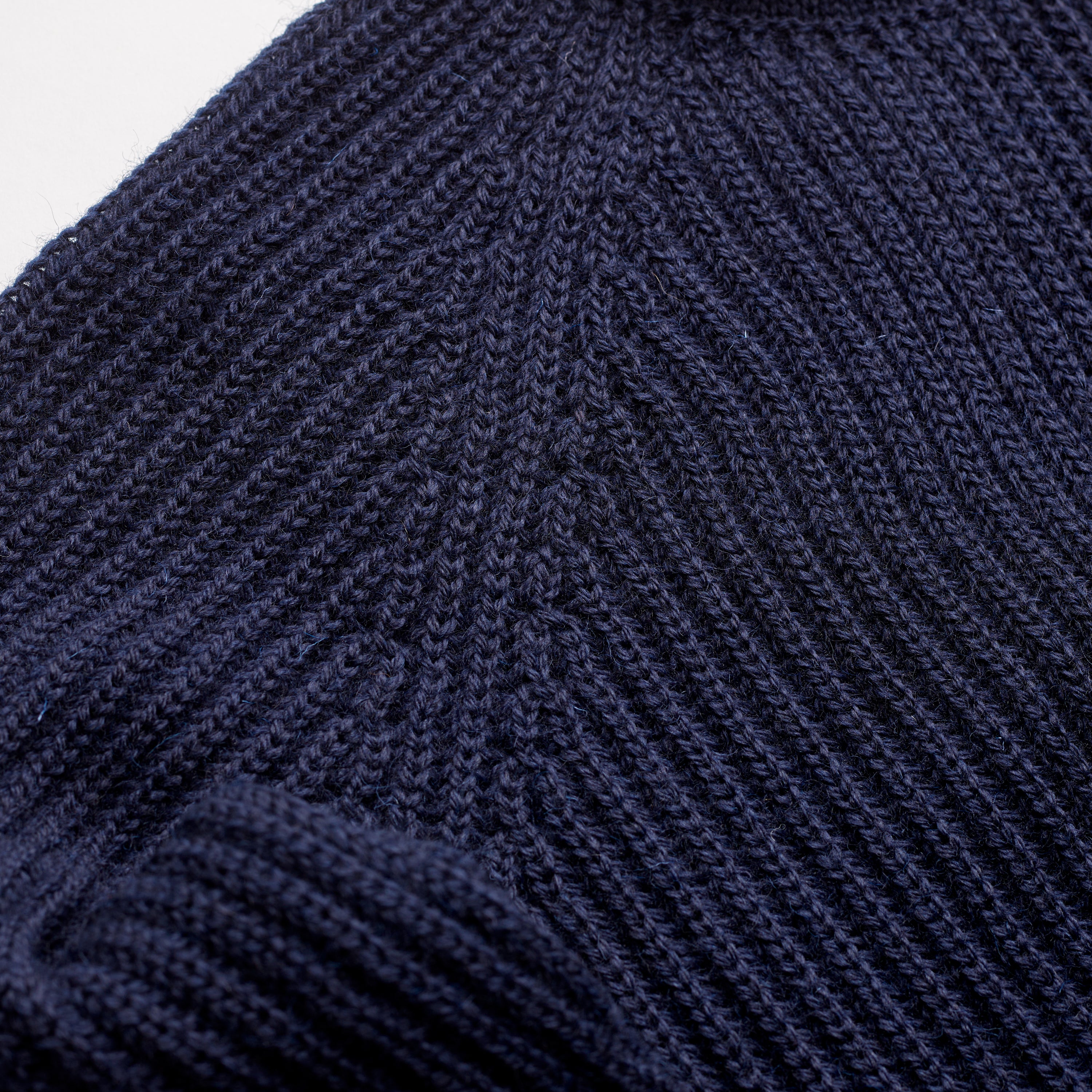 The Fisherman Ribbed Roll Neck Jumper in Navy